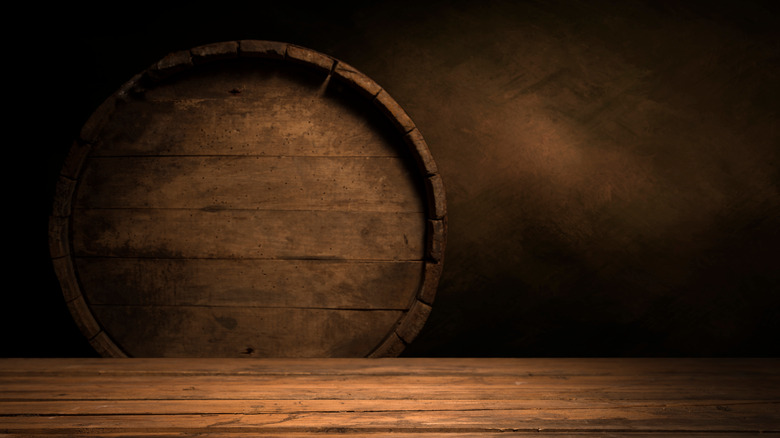 Oak barrel and wood background