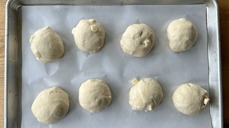 Bagel dough puffed on baking sheet