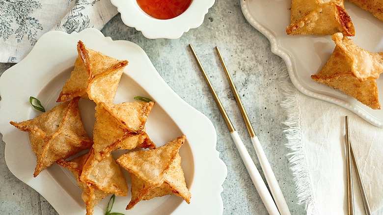 crab rangoon on white plate