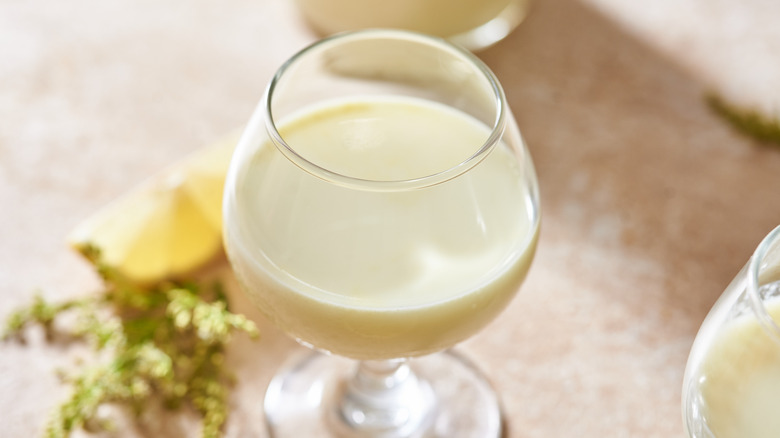 glass of limoncello on table