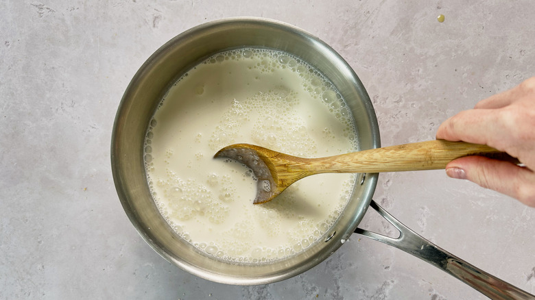 stirring the syrup in a pot