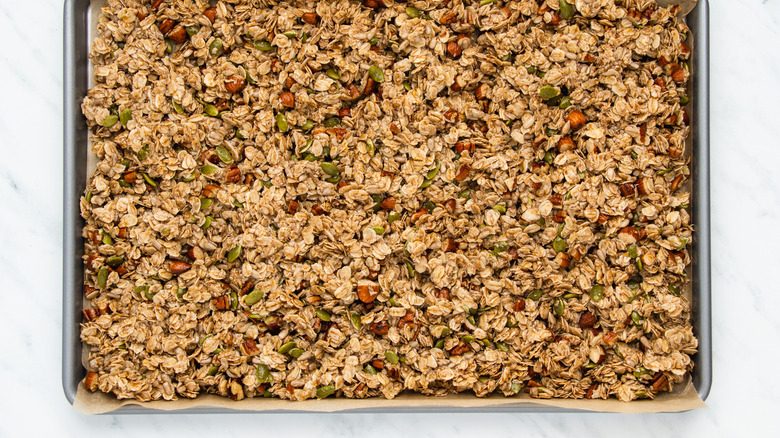 crunchy granola on baking sheet 