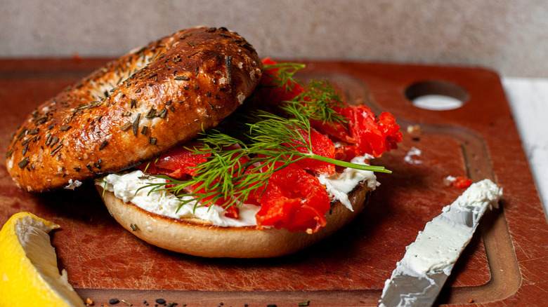 Homemade Cured Salmon slices on bagel