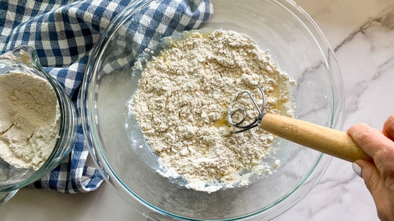 dough ingredients in glass bowl