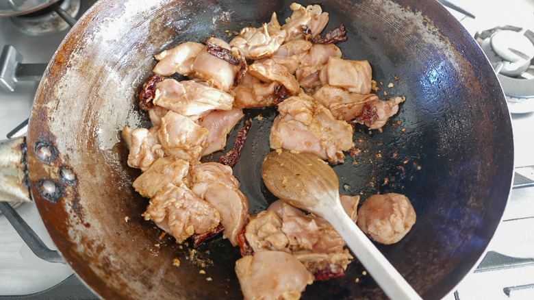 Chicken and aromatics stir frying