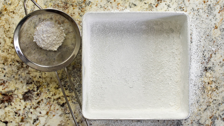 powdered sugar in sieve