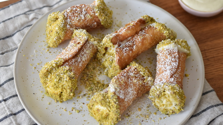 pistachio cannoli on plate