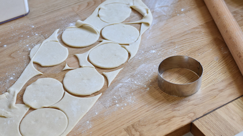 cutting dough circles cannoli