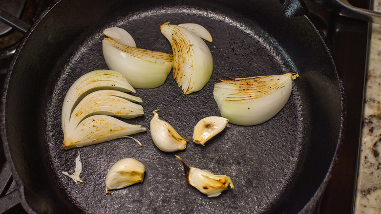 onions and garlic in pan