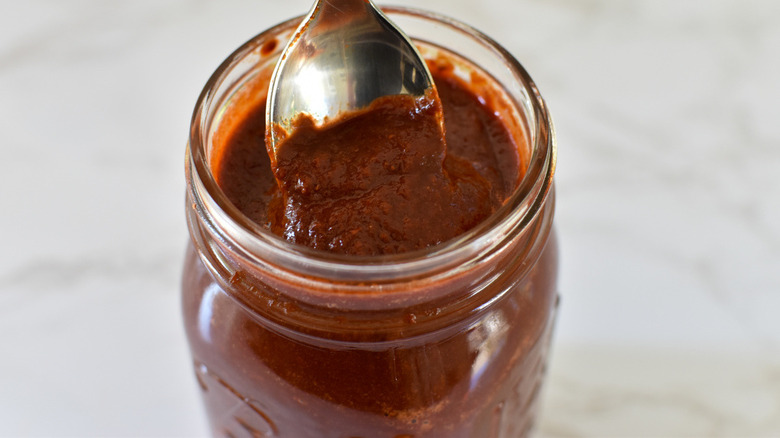 red enchilada sauce in jar