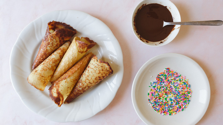 cones, sprinkles and melted chocolate