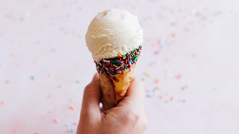 three waffle cones with sprinkles