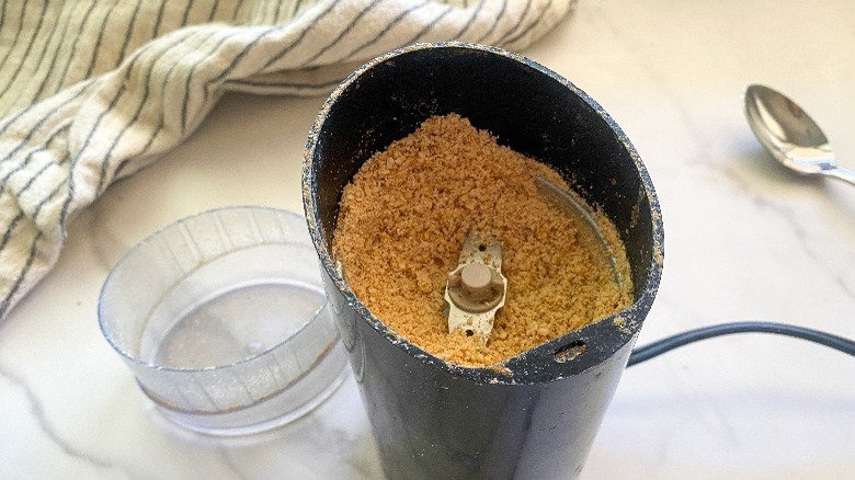 sesame seeds in small grinder