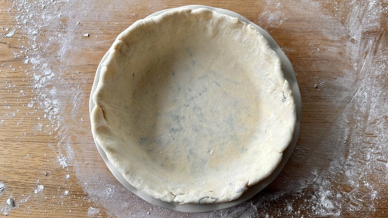 raw pie dough in dish