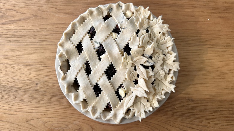 unbaked pie with leaf cutouts