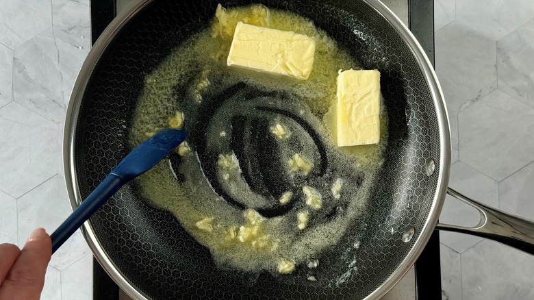 melted butter with chopped garlic