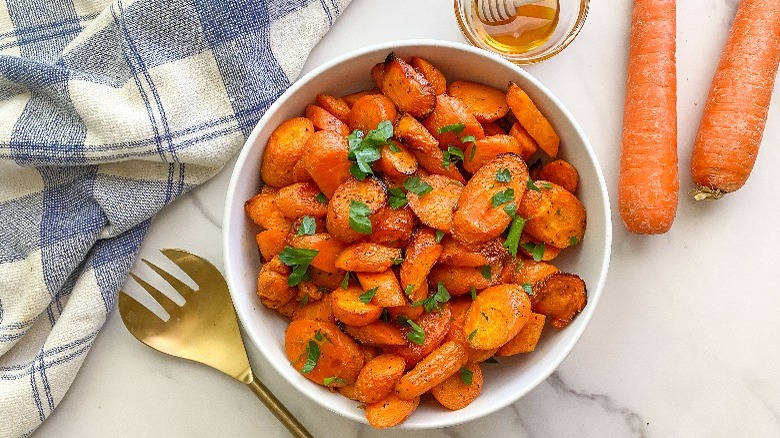 white bowl with glazed carrots