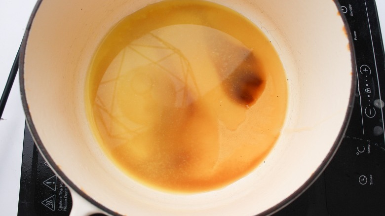 orange honey sauce in pot