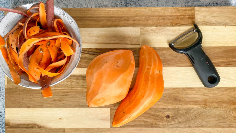 sweet potatoes on cutting board