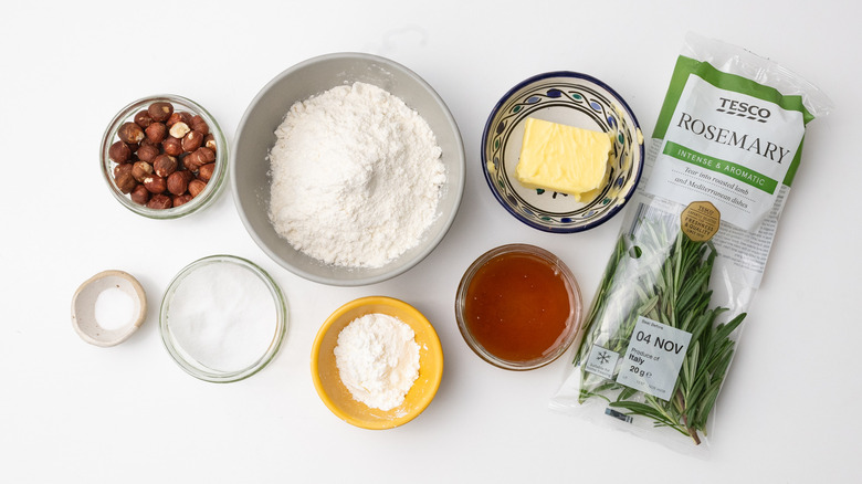 honey rosemary hazelnut shortbread ingredients on white table 