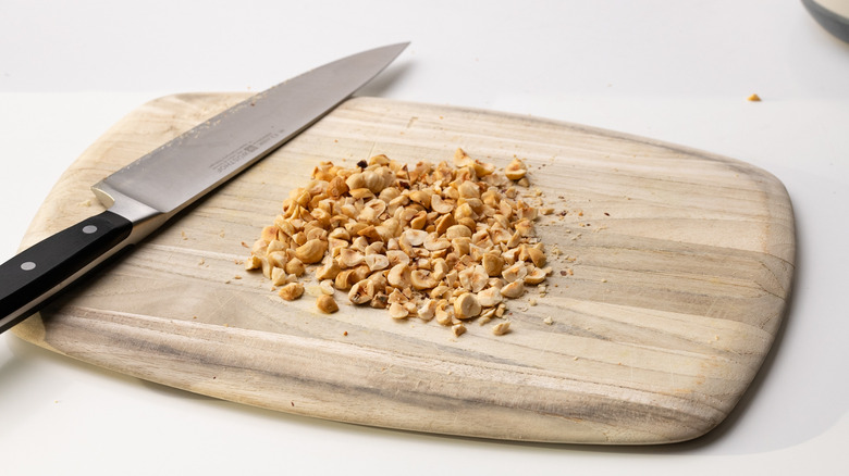 hazelnuts on a chopping board