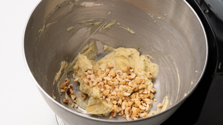 hazelnuts in a mixing bowl with batter