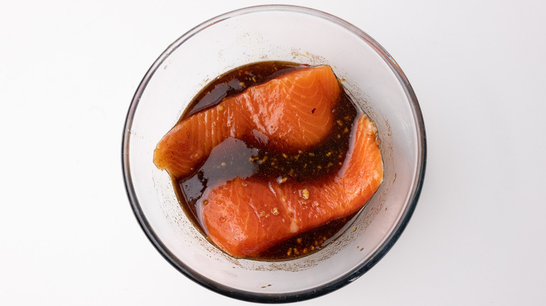 marinading rainbow trout in bowl 