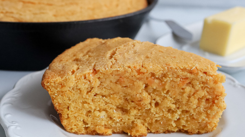 cornbread wedge on white plate