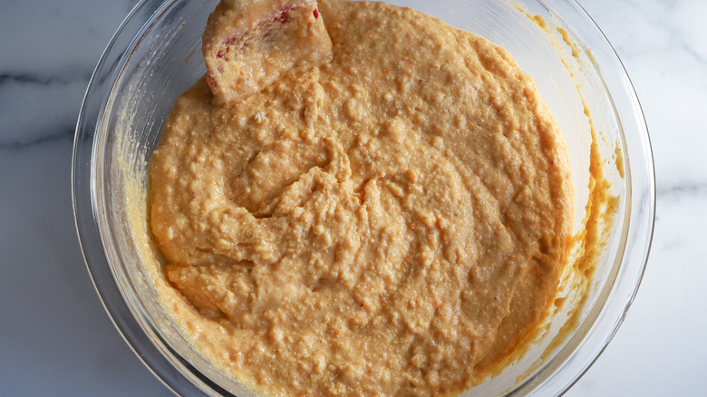 cornbread batter in clear bowl