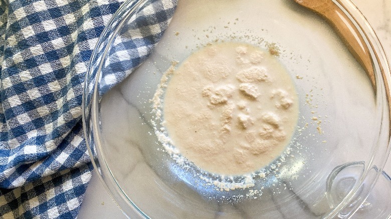 yeast and milk in bowl