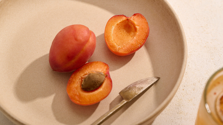 fresh apricots on plate