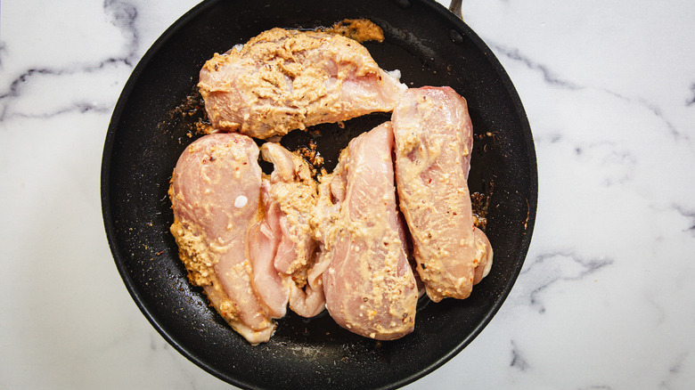 Chicken breasts in pan
