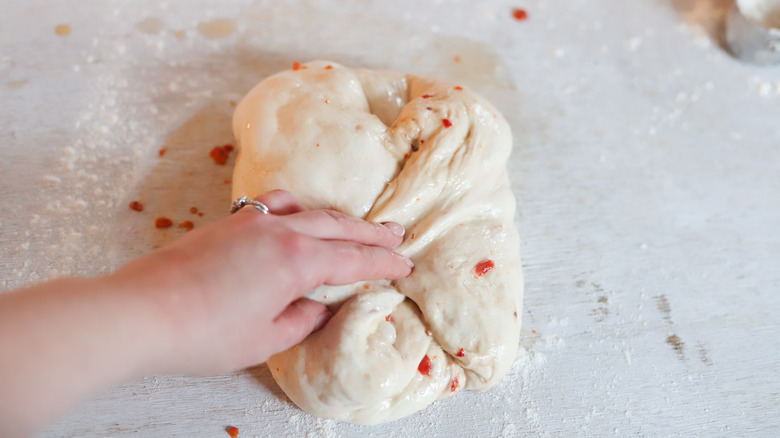 hand folding dough