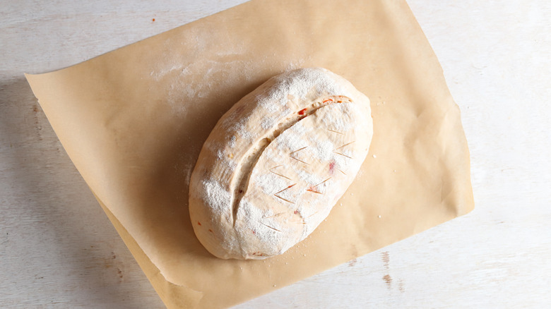 hot honey sourdough scored on parchment