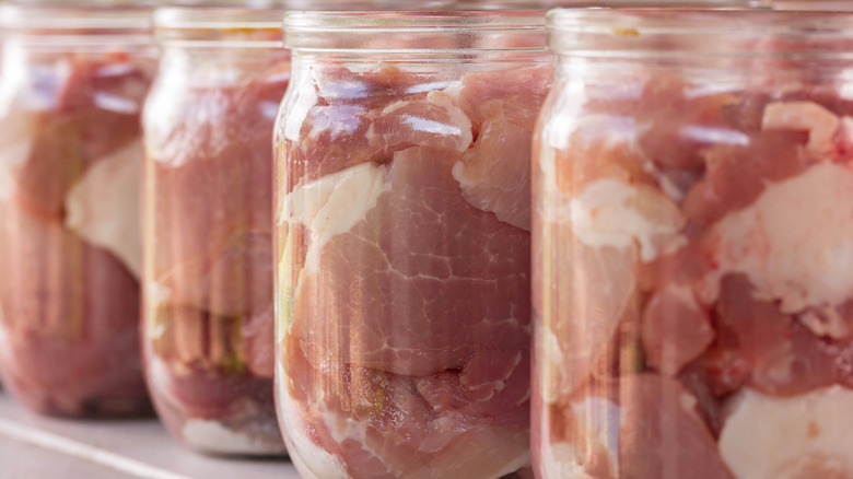 preserved pork in jars, raw-packed meat