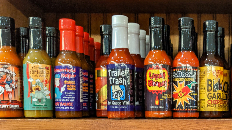 hot sauces on a shelf