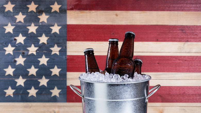 Bucket of beer in front of an American flag