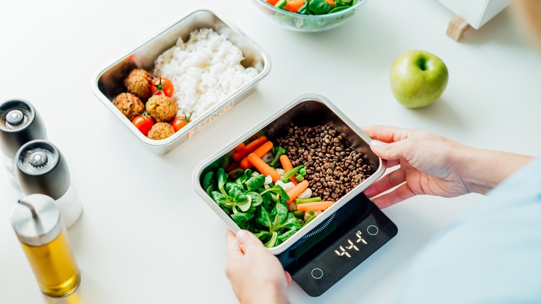 Weighing food on food scale