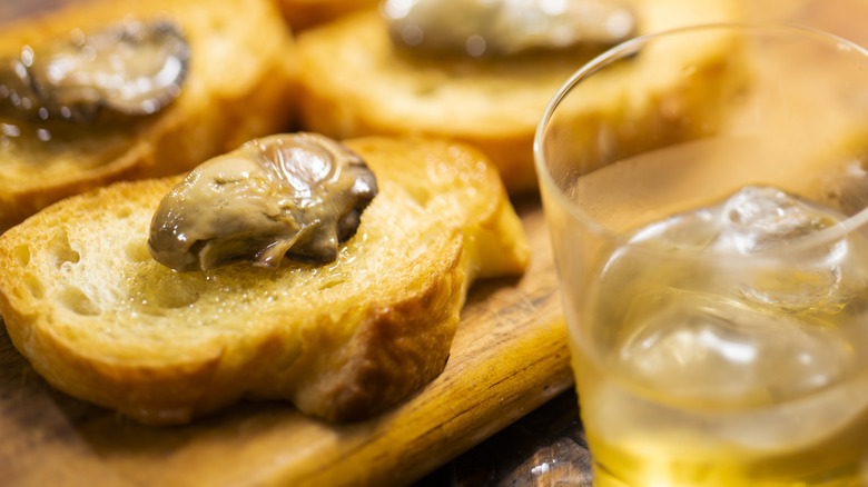 bread with oysters and whiskey