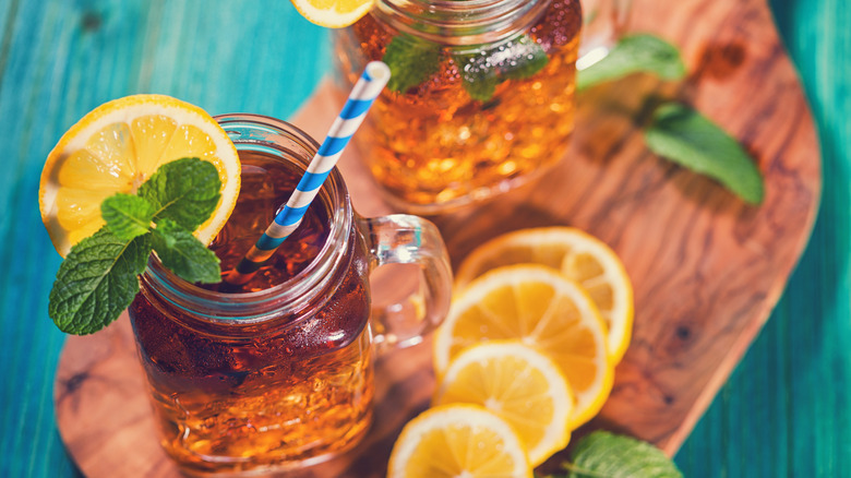 Glasses of iced tea with lemon and mint