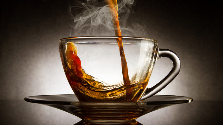 Coffee poured into a glass cup