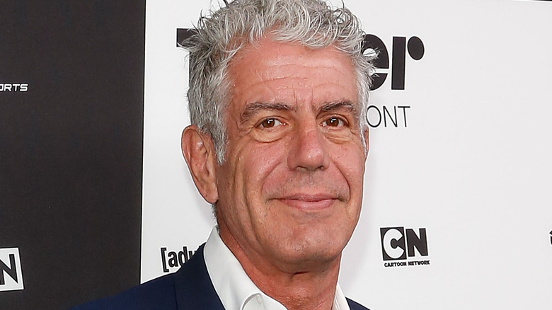 Anthony Bourdain in blue suit