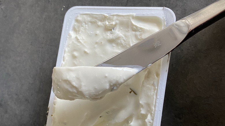 open package of cream cheese