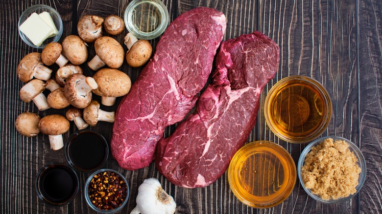 steak, bourbon, and marinade ingredients