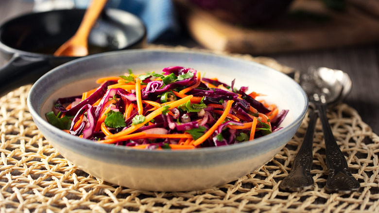 Bowl of coleslaw with silverware