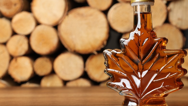 Maple shaped bottle on table