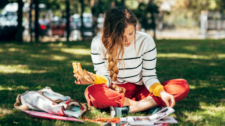 College student eating outside