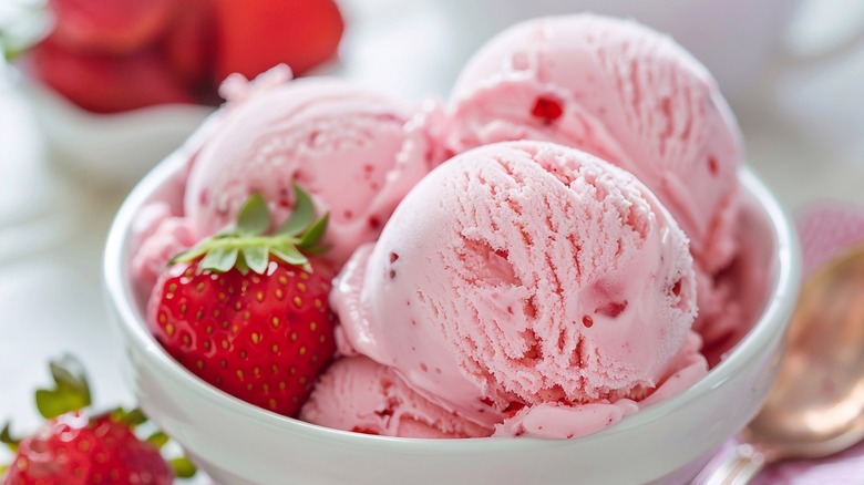 strawberry ice cream in white bowl