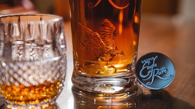 close up of eagle rare bourbon bottle and glass