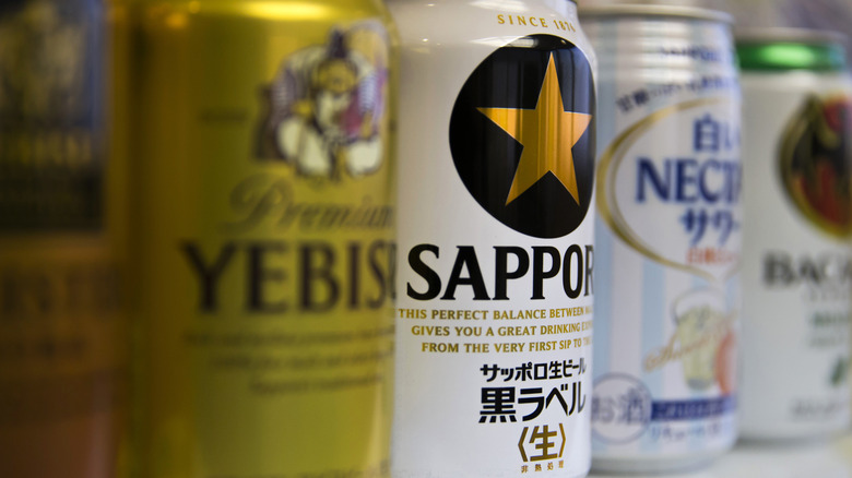 cans of Asian beer on shelf